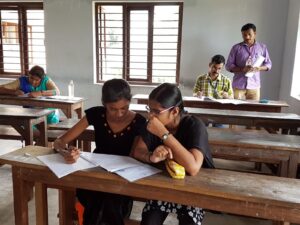An examination in progress, invigilated by faculty.